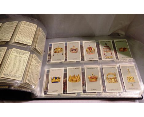 Royalty cigarette cards to include Famous Crowns (25), Kings and Queens (50), New Elizabeth Age (odds), Orman Coronation Stre