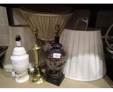 Three modern table lamps and a selection of shades. All electrical items in this lot have been PAT tested for safety and have