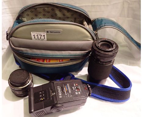 Canon and Vivitar lenses with a Miranda flash in travel bag. P&amp;P Group 2 (£18+VAT for the first lot and £3+VAT for subseq