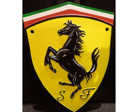 Cast iron Ferrari wall plaque, W: 25 cm. P&amp;P Group 1 (£14+VAT for the first lot and £1+VAT for subsequent lots) 