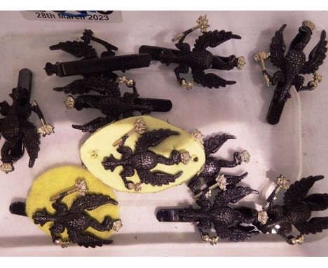 Nine Kings Royal Regiment cap badges. P&amp;P Group 1 (£14+VAT for the first lot and £1+VAT for subsequent lots) 