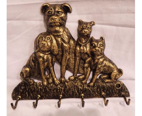 Bronzed dog tail coat hook, L: 23 cm. P&amp;P Group 1 (£14+VAT for the first lot and £1+VAT for subsequent lots) 