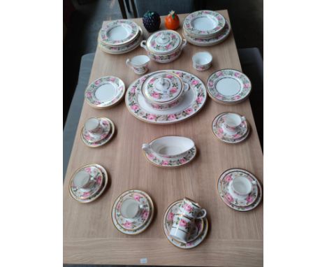 A Large Royal Worcester ' royal garden' pattern tea/dinner service along with 2 Carlton ware fruit preserve jars 