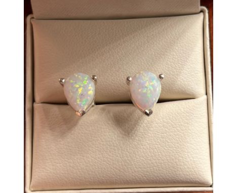 A Pair of 925 silver and pear shaped opal stud earrings. 