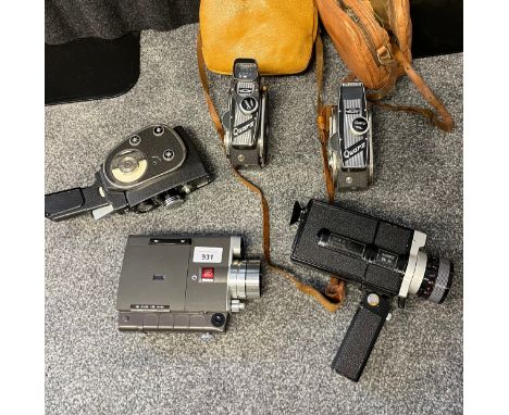 A Lot of five vintage cine movie cameras. Includes three Quartz, Sankyo and Hanimex makes 