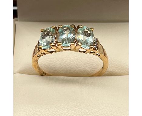 10ct yellow gold ladies ring set with aquamarine stones. [Ring size R 1/2] [2.43grams] 