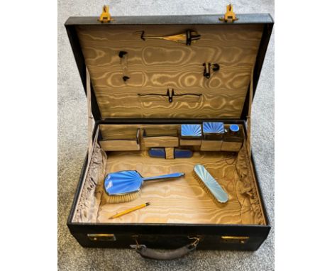 Antique/ vintage leather travel case containing Silver and blue enamel lidded preserve pots and hand brushes. 
