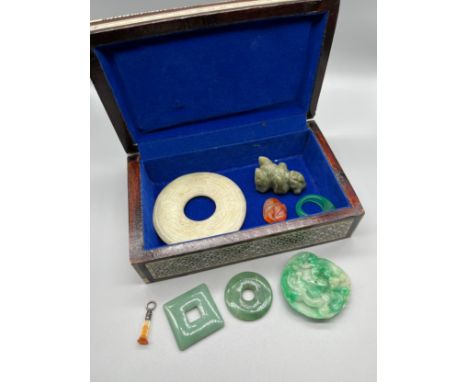 Indian box containing various Chinese Jade and hardstone carvings. Also includes and antique silver and agate stone seal pend