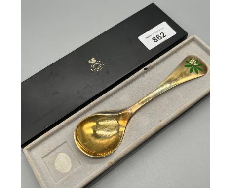 Georg Jensen Sterling silver gilt spoon with enamel design finish. Dated 1965. Comes with box. 