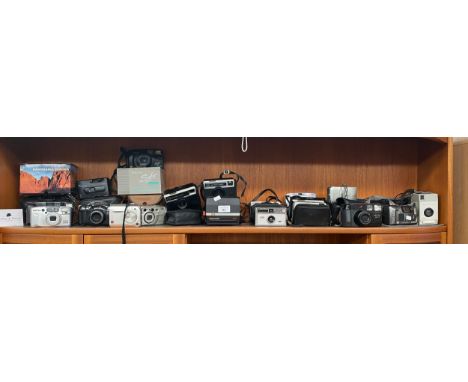 A Large collection of cameras to include Kodak, Pentax, polaroid etc 