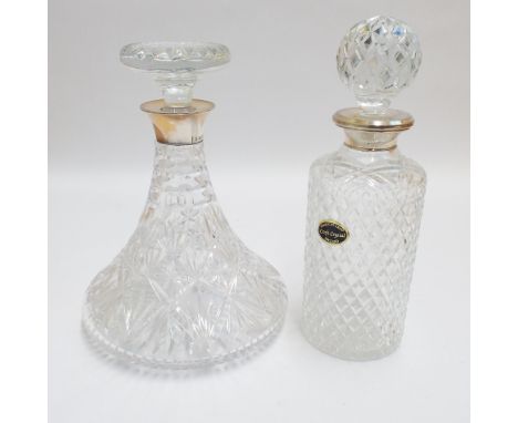 Cut glass ship's decanter with hallmarked silver collar and a lead crystal spirit decanter with silver collar 