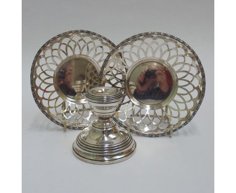 Pair of Edwardian silver pierced dishes hallmarked for Birmingham 1907 and a small silver candlestick - 13cm diameter  Condit