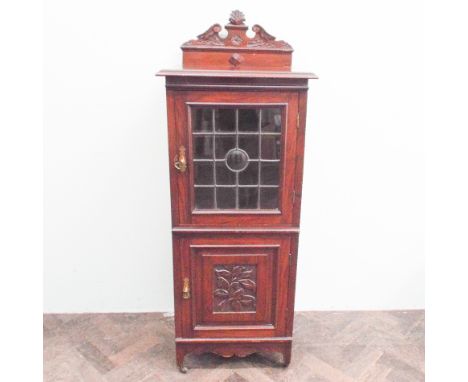 21" Edwardian leaded glazed cabinet with cupboard under and carved panel door