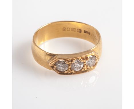 22 ct gold ring set with three brilliant cut diamonds set in a panel. Ring size approx O