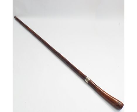 Early 20th century walking cane/swordstick with white metal ferreule- overall length from tip of blade to handle is 82.5cm   