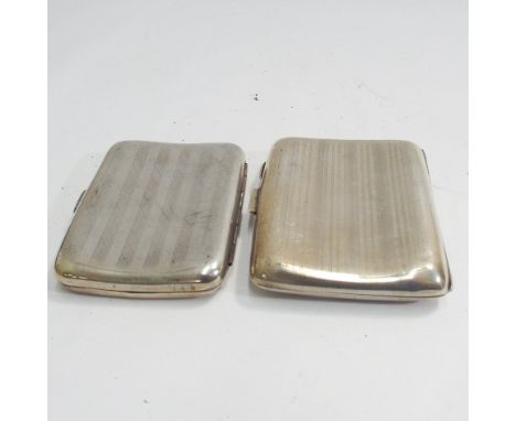 Two silver cigarette cases both with engine turned decoration, each 8.5cm, approx 5 ozs in weight  Condition - both have inde