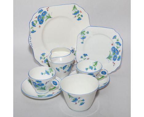 Art Deco Gladstone china ten place setting tea service decorated with blue flowers on white background   Condition - good 