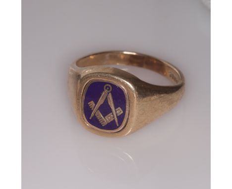 9ct yellow gold signet ring set with an oval blue enamel swivel panel of Masonic motif, size V, engraved to the underneath L 