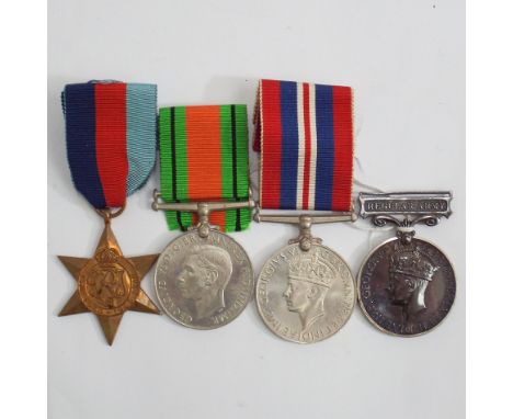 Group of four second world war medals including army long service and good conduct example with regular army bar awarded to P