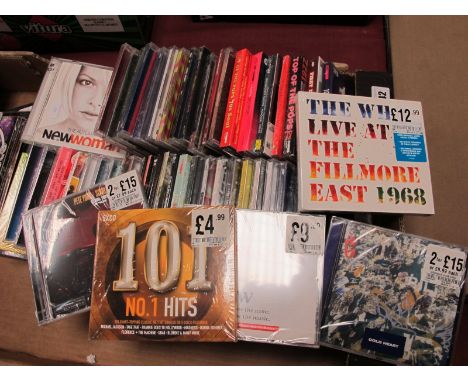 Over Fifty CD's Largely Unopened in Their Original Shrink Wrapping, to include artists  George Michael, Justin Bieber, The Wh
