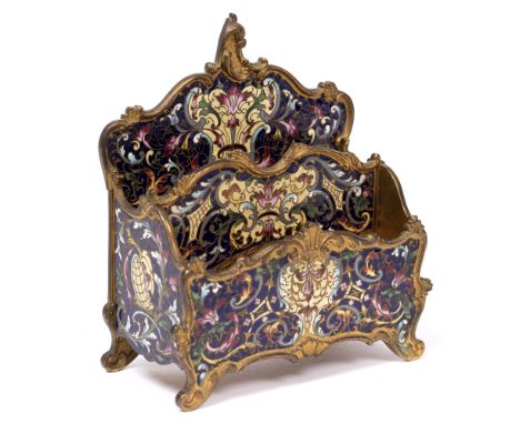 A LATE 19TH CENTURY FRENCH GILT METAL AND CHAMPLÊVÉ ENAMEL LETTER RACK, of shaped two division form, decorated with stylised 