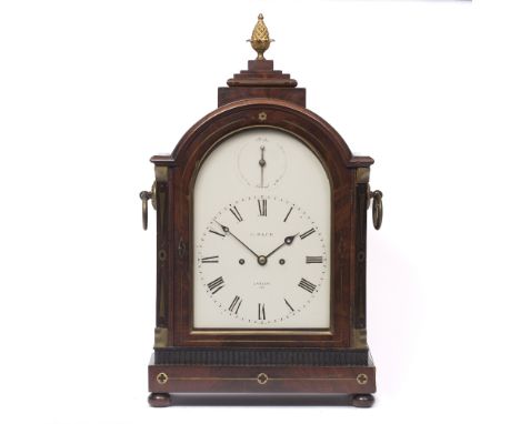 CHARLES PACE, LONDON An early Victorian mahogany table clock, the arched Roman dial signed and numbered 155 with strike/silen