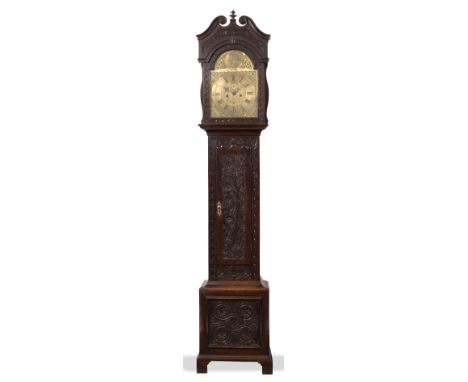 RICHARD PEYTON, GLOUCESTER An oak eight day longcase clock, the 12" break arch brass dial with Roman chapter ring, Arabic fiv