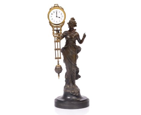 AN ART NOUVEAU MYSTERY TIMEPIECE with white enamel Arabic dial supported by a bronzed spelter figure of a loosely draped woma