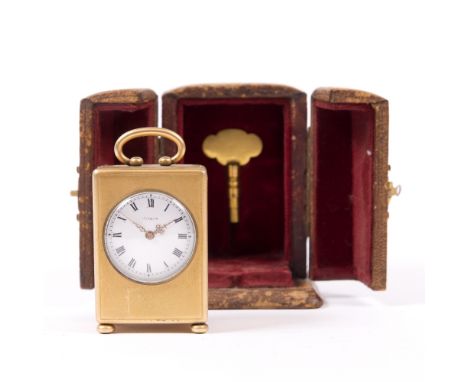 A LATE 19TH CENTURY MINIATURE CARRIAGE TIMEPIECE the white enamel Roman disc dial signed Robin, the movement with lever escap