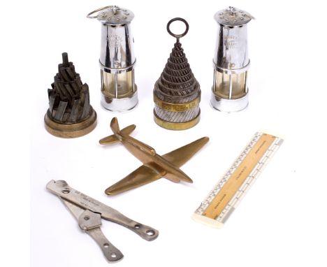 A PAIR OF MINIATURE MINER'S LAMPS by the Protector Lamp & Lighting Company Ltd, Eccles, 12cm high; a boxwood and bone rule by