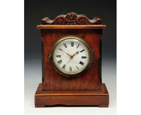 A 19TH CENTURY FIGURED WALNUT MANTEL TIMEPIECE with white enamel Roman dial, centre seconds and watch movement, signed Leekey