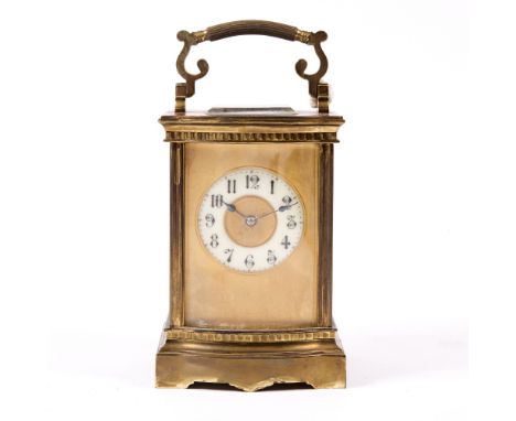 A LATE 19TH CENTURY FRENCH CARRIAGE CLOCK the Gothic enamel chapter ring with gilt mask, platform lever escapement and coiled