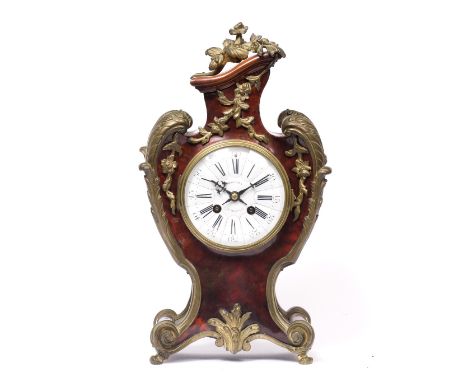 A 19TH CENTURY FRENCH ROCOCO STYLE MANTEL CLOCK the white enamel Roman lobed dial with Arabic five minutes, signed Richone, t