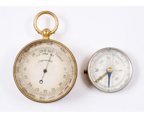 A GILT BRASS POCKET BAROMETER COMPENDIUM the silvered dial with outer altitude ring, mother of pearl compass, thermometer sca