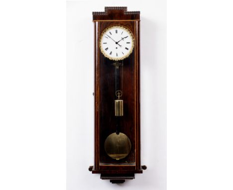 A 19TH CENTURY VIENNA REGULATOR TIMEPIECE with white enamel Roman dial, gilt pie crust bezel, brass cased weight and pendulum