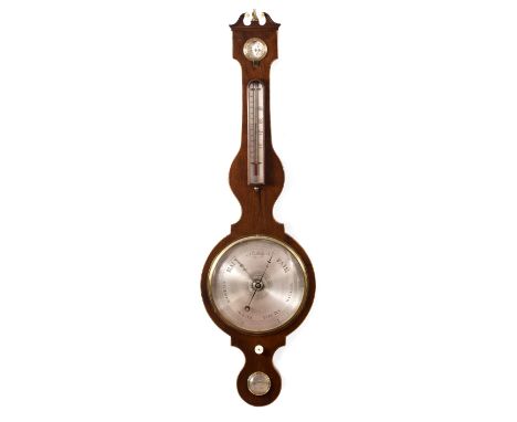 A GEORGE III MAHOGANY FOUR GLASS WHEEL BAROMETER with 10" silvered dial, hygrometer, thermometer and level, the boxwood strun