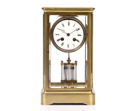 A LATE 19TH CENTURY FRENCH BRASS FOUR GLASS MANTEL CLOCK with white enamel Roman dial, Japy twin train bell striking movement