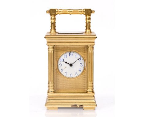 A FRENCH MINIATURE CARRIAGE TIMEPIECE the circular white enamel dial with blue Arabic numerals, engine turned mask and platfo