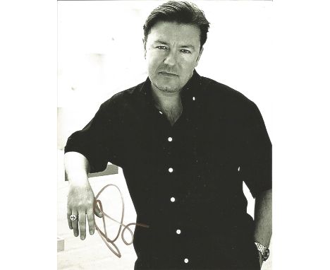Ricky Gervais signed 10x8 black and white half body portrait photo. Good Condition. All autographs are genuine hand signed an