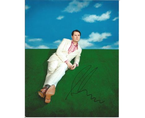Jimmy Carr comedian signed 10x8 relaxed full body shot colour photo, James Anthony Patrick Carr, born 15 September 1972 is an