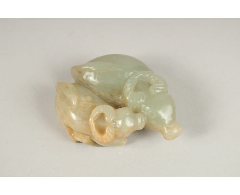 A CHINESE CARVED JADE GROUP OF TWO RAMS. 6cms.