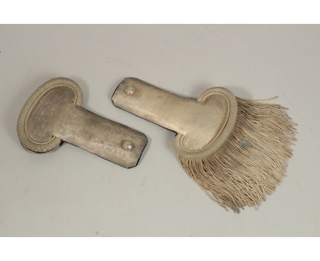 A PAIR OF SILVER EPAULETTES, REPUBLIC OFFICER in a box, lid missing. O.M.C. PARIS 1ST TITRE.