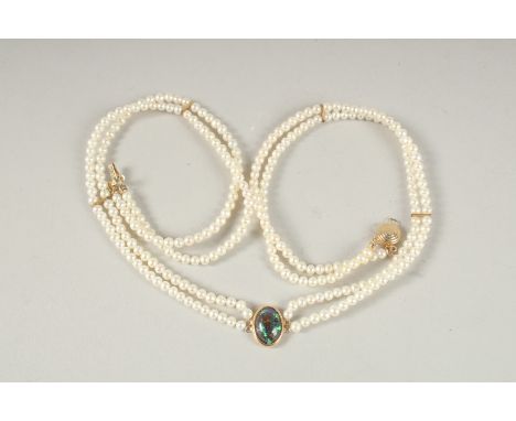 A TWO ROW PEARL AND BLACK OPAL NECKLACE.