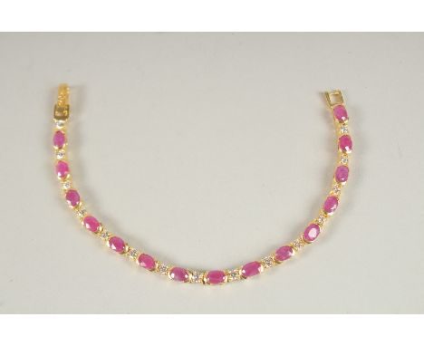 A SILVER RUBY LINE BRACELET.