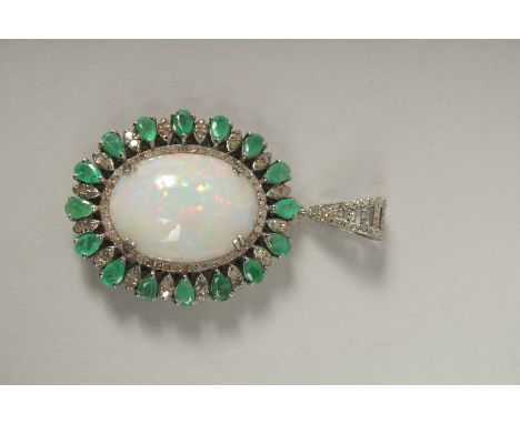 A SILVER AND GOLD OPAL, EMERALD AND DIAMOND PENDANT.