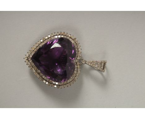A SILVER SET LARGE AMETHYST AND DIAMOND PENDANT.