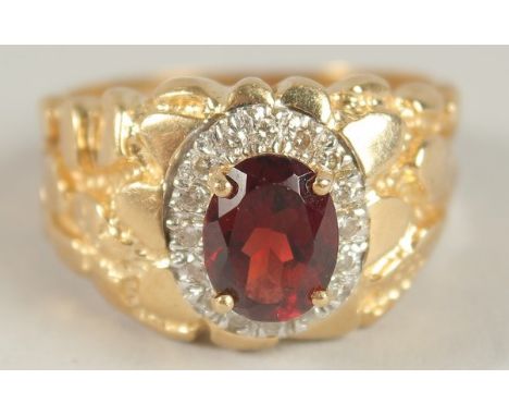 A GOOD YELLOW GOLD RUBY AND DIAMOND FANCY RING.