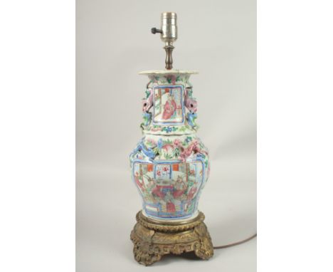 A GOOD CANTON PORCELAIN LAMP on a gilt base. Lamp: 30cms high.