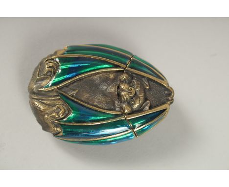 A BRASS AND ENAMEL BAT VESTA. 6cms.