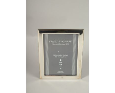 A HALLMARKED STERLING SILVER PHOTOGRAPH FRAME. 18cms x 13cms.